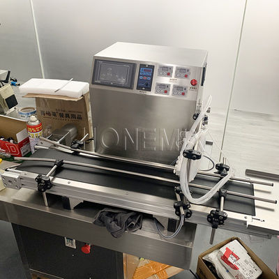 Small 4 Head Liquid Filling Machines Electric With Conveyor Belt