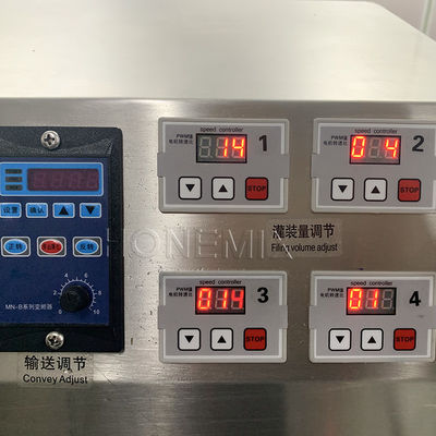 Small 4 Head Liquid Filling Machines Electric With Conveyor Belt